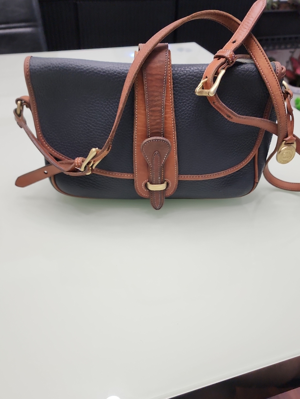 Dooney & Bourke Vintage  Black Pebbled Leather Crossbody with Brown Trim